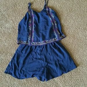 Navy blue petite romper with design on top part